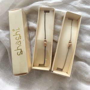 Shashi Gold Jewel Bracelets - black/beige